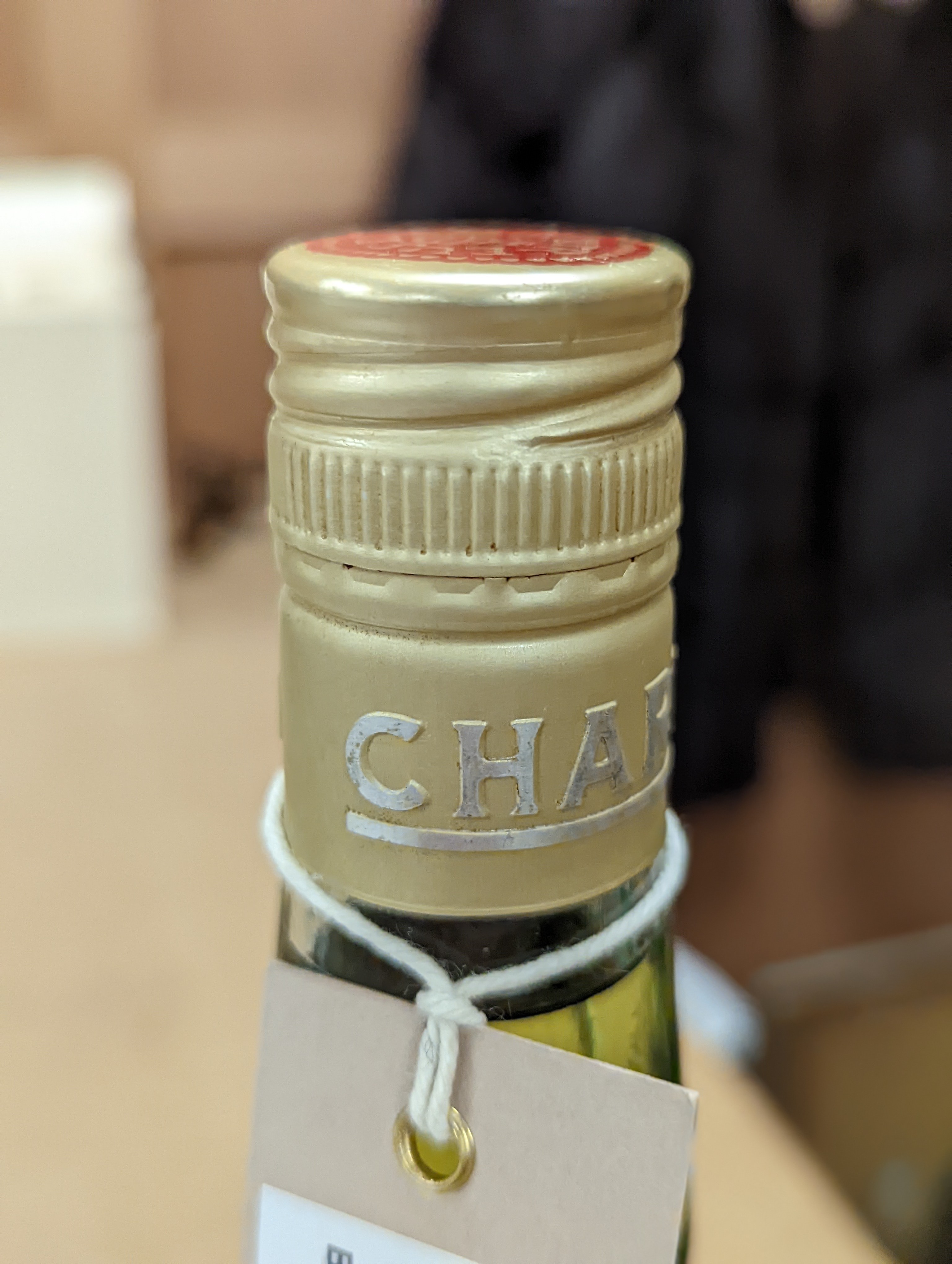 One Chartreuse bottle and ten Chartreuse miniatures